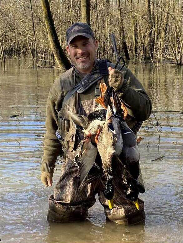 Dr. Jason McConnell Holding hunted ducks